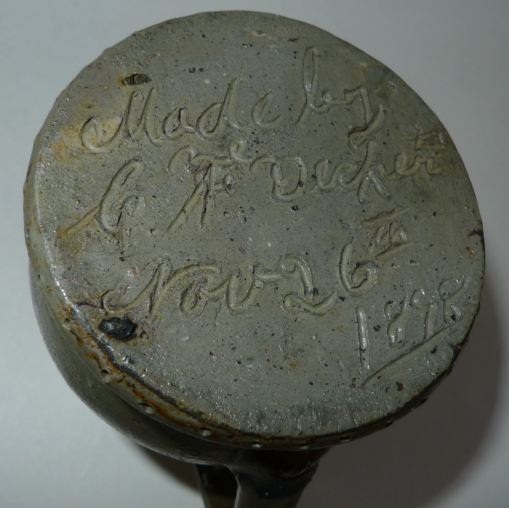 The bottom of A Present pitcher signed in script. ai21.