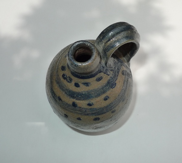 Top view of small decorated jug. ai28.