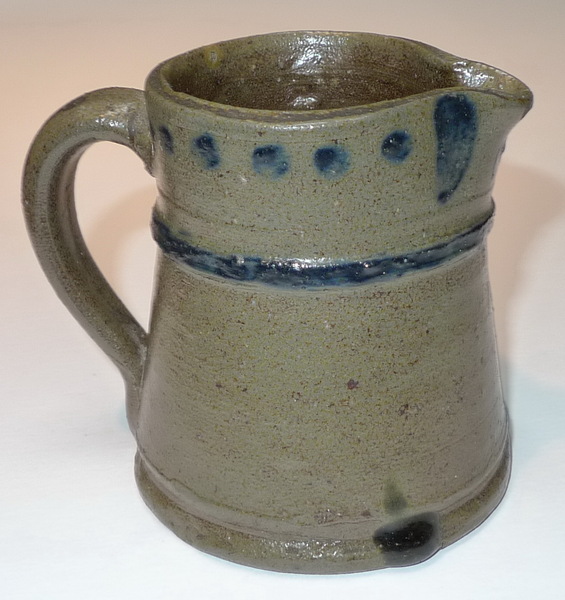 Small lighthouse-shaped decorated pitcher. ai29.