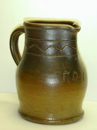 Incised decorated pitcher with the initials F.D.H. aiI5.