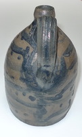 View of handle on small decorated jug. ai25.