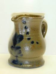 Small tulip and dot decorated pitcher. ai5.